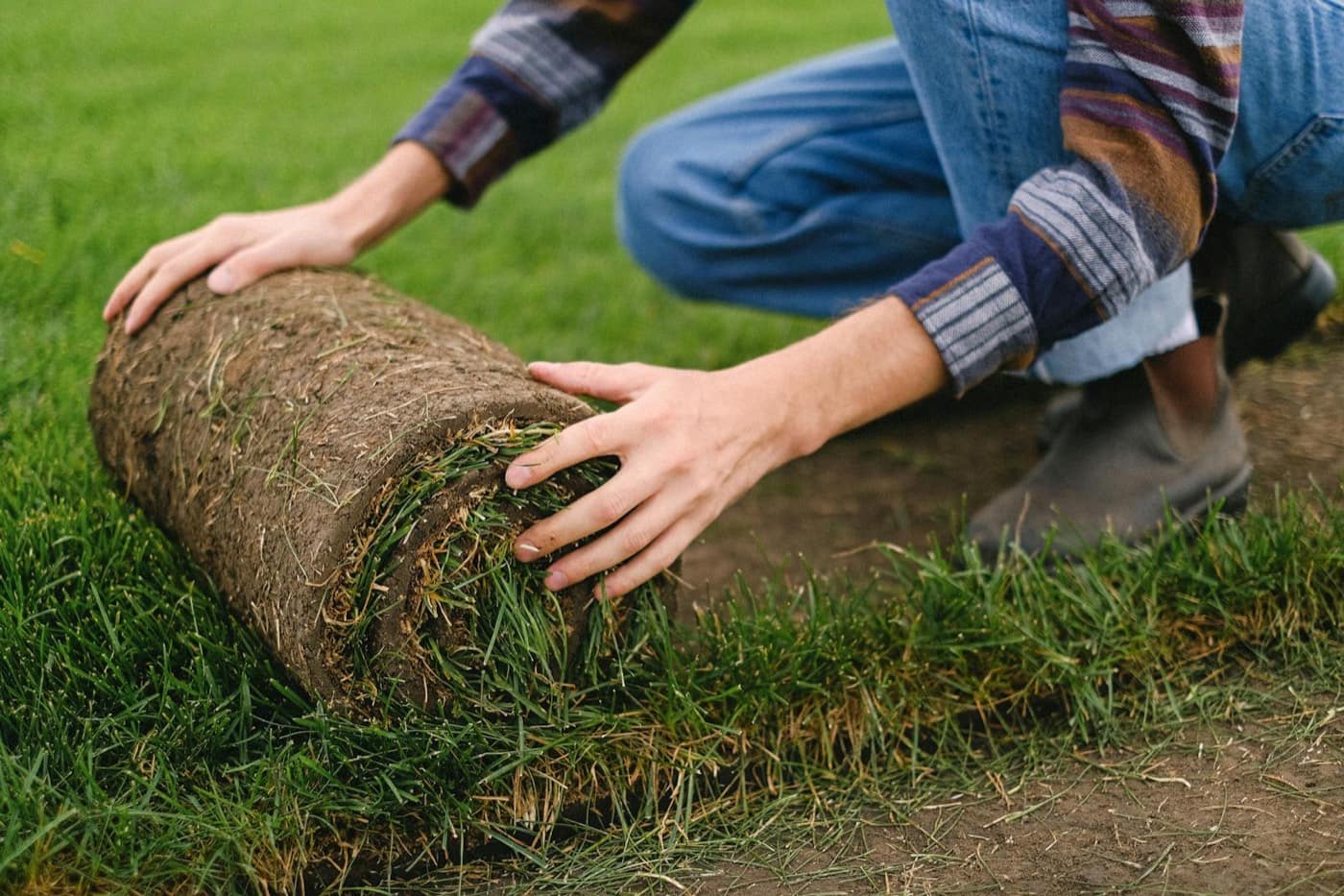 Artificial turf base preparation and installation process in Denver